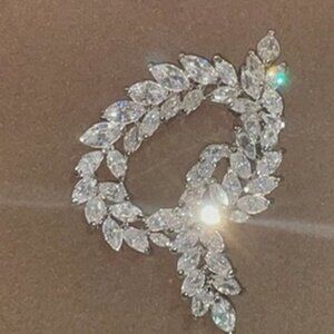 Nolan Miller Designer 'Glamour Collection'Jewelry - 'Magical Marguise Knot Pin'